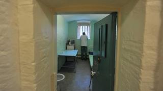 Prisoner in a cell