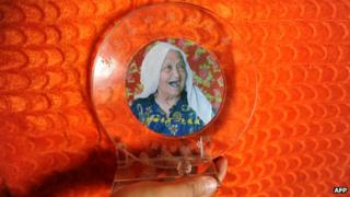 A trophy given to Almihan Sayit for being the country's oldest women by the China Gerontological Society, in August 2013