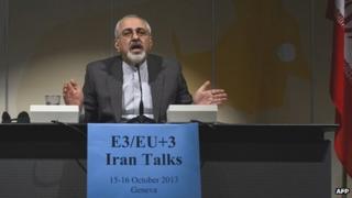 Iranian Foreign Minister Mohammad Javad Zarif speaks during a press conference closing a two-day of closed-door nuclear talks on October 16, 2013 in Geneva.