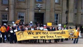 Fans outside the railway station in Huddersfield