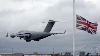 The RAF plane carrying the coffin of L/Cpl James Brynin lands at RAF Brize Norton