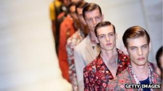 Male models wearing Gucci clothes