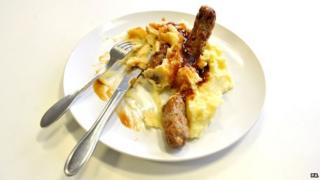 A plate of sausages and mash