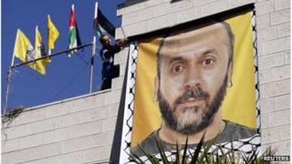 Banner showing Palestinian prisoner Moses Qaran in Ramallah