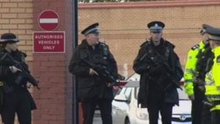 Govan police station with armed police outside