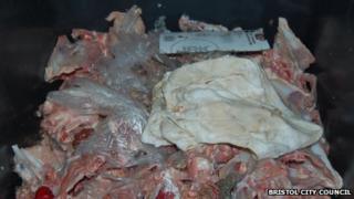 Raw chicken in a wheelie bin at Hamza Poultry Limited