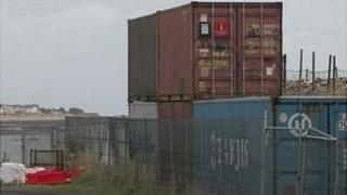 Shipping containers filled with asbestos at La Collette