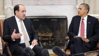 Iraqi Prime Minister Nouri Al-Maliki (L) speaks with US President Barack Obama in the Oval Office at the White House 1 November 2013