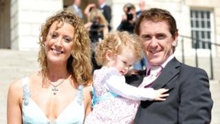 AP McCoy with his his wife Chanelle and daughter Eve at his Stormont reception in 2009