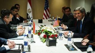 US Secretary of State John Kerry (C-R) and members of his delegation meet with Egypt's Foreign Affairs Minister Nabi Fahmy (C-L) and other Egyptian officials during Mr Kerry's visit to Egypt on 3 November 2013 at the Fairmont Hotel in Cairo