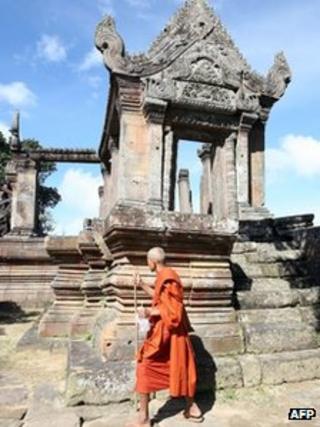 A Cambodian Buddhist monk walking at the Preah Vihear temple, some 543 kilometers north of Phnom Penh, along the border with Thailand, This file photo taken on November 7, 2008