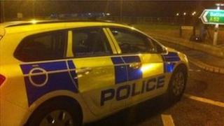 Police vehicle blocking road