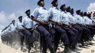 Somali policemen march during the Somalia's independence day at Konis stadium in Mogadishu - July 2013