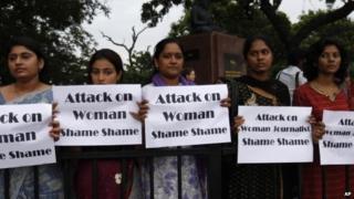 Women protest against the gang rape of a photojournalist in Mumbai