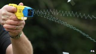 A 26 February 2013 file photo of police demonstrating the use of a Taser