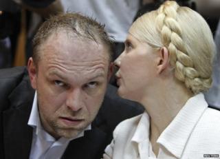 Yulia Tymoshenko (right) with her lawyer Serhiy Vlasenko in court in Kiev, June 2011