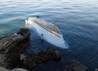 The migrants' capsized boat on the coast of Lefkada, Greece, 15 November