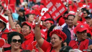 Red-shirted supporters of Mr Thaksin at a rally in Rajamangala national stadium in Bangkok, Thailand, 19 November 2013