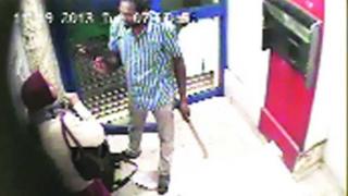 CCTV footage of the man attacking Jyothi Uday in a cash machine kiosk in Bangalore, 19 November 2013