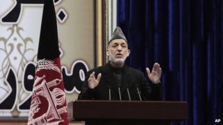 Afghan Persident Hamid Karzai addresses the Loya Jirga