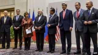 The EU foreign policy chief Catherine Ashton announces the deal in Geneva, accompanied by the foreign ministers of Iran, the US, UK, Russia, China, France and Germany.