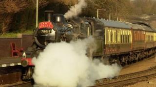 A steam train running on the railway