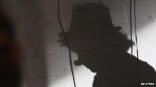 Clown in shadow