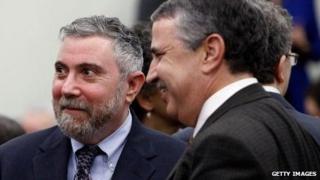 New York Times columnists Paul Krugman and Tom Friedman at a White House forum on December 3, 2009.