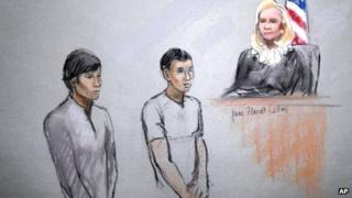 This courtroom sketch signed by artist Jane Flavell Collins shows defendants Dias Kadyrbayev, left, and Azamat Tazhayakov appearing in front of Federal Magistrate Marianne Bowler at the Moakley Federal Courthouse in Boston 1 May 2013