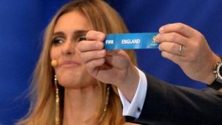 Fifa Secretary General Jerome Valcke holds up England's name in the 2014 World Cup final draw in Brazil on December 6, 2013.