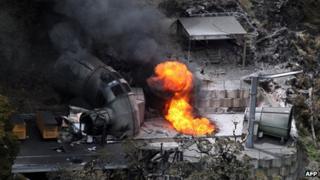 File photo: This aerial photo taken on 30 November 2010 shows flames coming out of a ventilation shaft at the Pike River Coal mine near Greymouth on New Zealand's West Coast