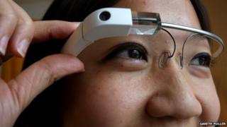 woman demonstrates the Google Glass