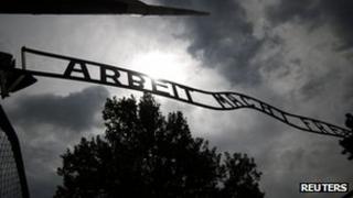 The sign "Arbeit macht frei" at the main gate to the Auschwitz concentration camp