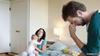 Generic photo of parents with baby