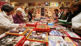 People buying Christmas cards