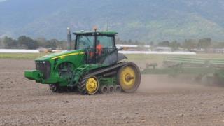 Tractor and plough, Tanzania