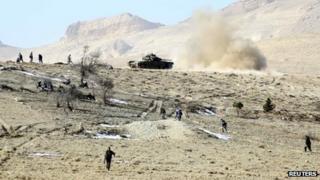 Image from Syrian state media showing forces loyal to Syria's President Bashar al-Assad in the Qalamoun mountains north of Damascus