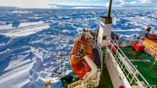 This handout image released by the Centre of Excellence for Climate System Science at the University of New South Wales and taken by Andrew Peacock of www.footloosefotography.com on December 27, 2013 shows the ship MV Akademik Shokalskiy trapped in the ice at sea off Antarctica