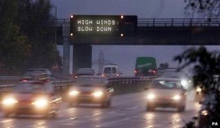 A motorway sign warning of bad weather