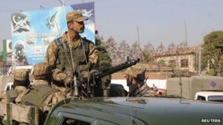 Soldiers patrol the Armed Forces Institute of Cardiology (AFIC) where former Pakistani President Pervez Musharraf is admitted for treatment in Rawalpindi January 2, 2014.
