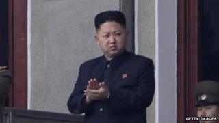 North Korean leader Kim Jong Un applauds during an official ceremony on April 14, 2012.