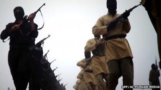 Isis fighters in an image released by the organisation