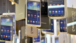 Cardboard cut-outs of Samsung Galaxy Note 3 on display
