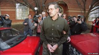 Aldrich Ames in front of a courthouse