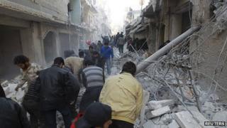 Search for survivors after air strike in Aleppo. 28 Dec 2013