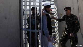 A prisoner is freed after a ceremony handing over Bagram prison to the Afghan authorities in March 2013