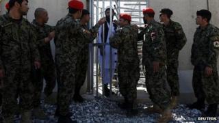 Prisoner awaits release during ceremony handing over Bagram prison to Afghan authorities. March 2013