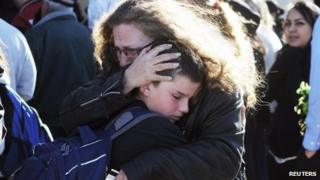 Students are reunited with family following a shooting at Berrendo Middle School 14 January 2014