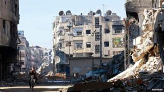 Rubble of the Harasta area of eastern al-Ghouta, near Damascus, on 24 December 2013