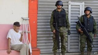 Mexican soldiers patrol the streets of Apatzingan, Michoacan. Photo: 16 January 2014